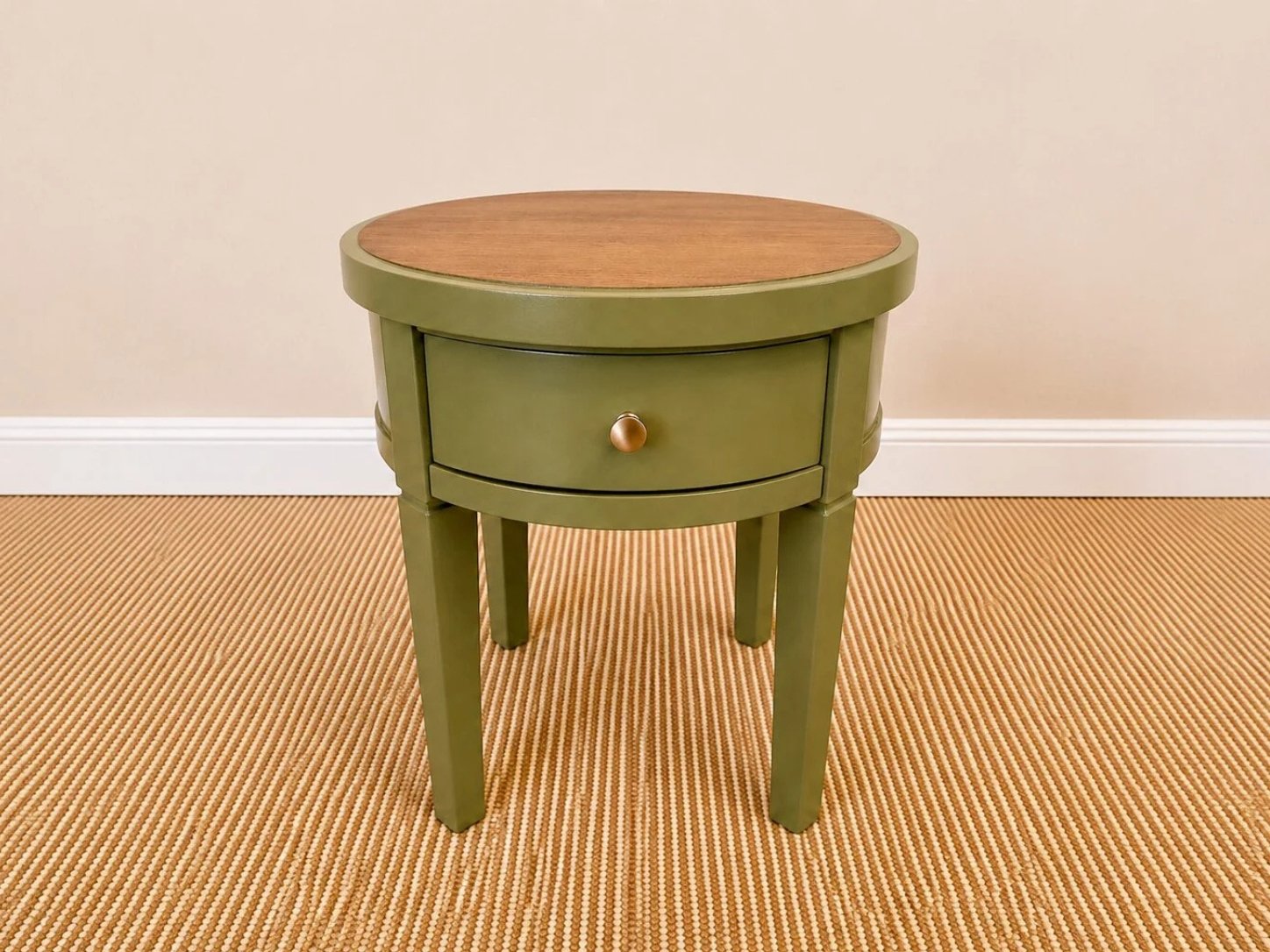 Refinished round end table in Oregano Spice with a stained wood top, styled in a warm, contemporary living room.